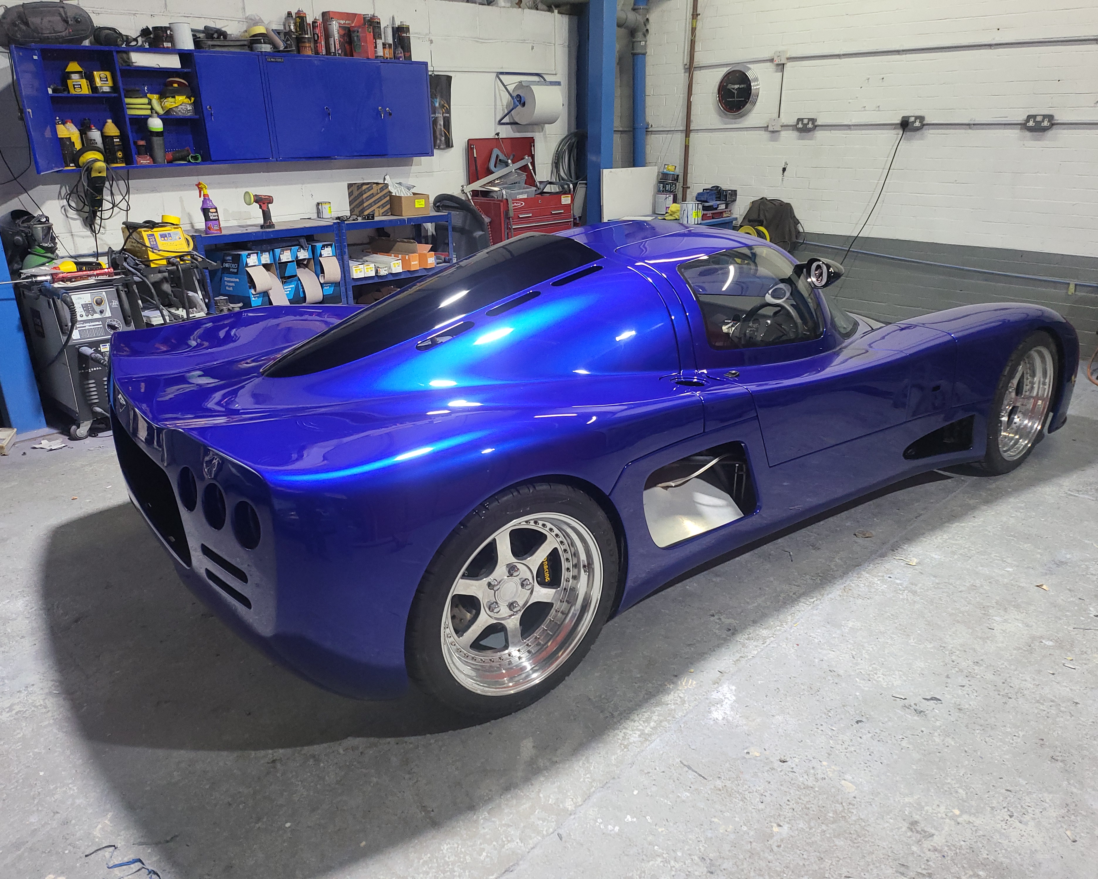 Professional custom blue car restoration and paint work at CJVS Cardiff bodyshop